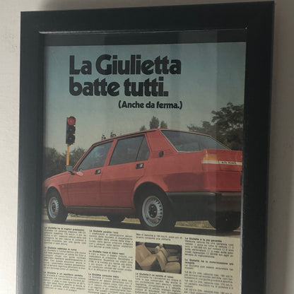 Alfa Romeo, Pubblicità Anno 1981 la Giulietta Batte Tutti Anche da Ferma - Raggi's Collectibles' Automotive Art