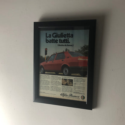 Alfa Romeo, Pubblicità Anno 1981 la Giulietta Batte Tutti Anche da Ferma - Raggi's Collectibles' Automotive Art