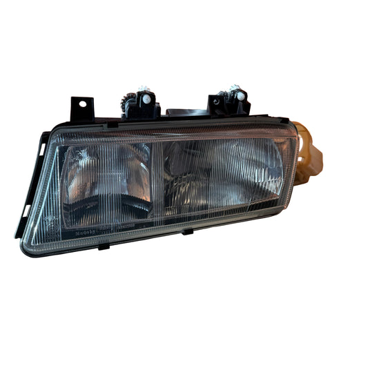 Lancia Delta Fanale Proiettore Anteriore Sinistro con Regolazione Assetto Fari Nuovo Originale 7791394 - Raggi's Collectibles' Automotive Art