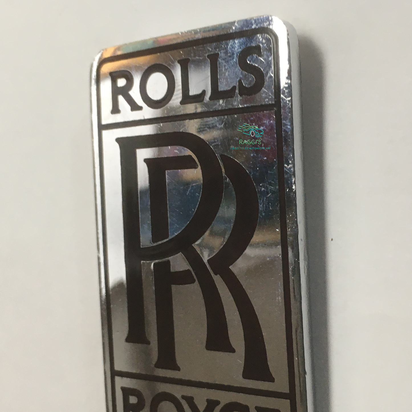 Rolls-Royce, Original Rolls-Royce Emblem with Dark Red Letters, Mounted on a Springfield Rolls-Royce, Very Rare